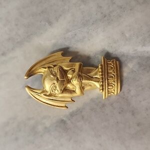 JJ Jonette gold tone gargoyle brooch